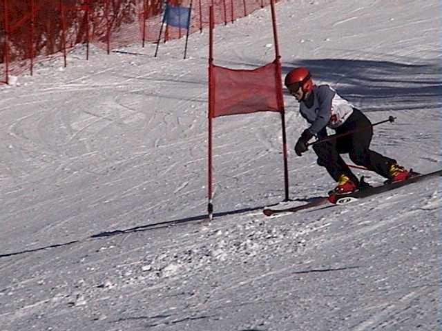 The sign of a real racer - Georgina with a big smile on her face heading for silver in her age group