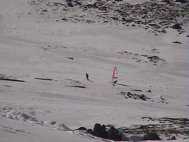 Man-hauled wind ski thingy heading west onto the main range