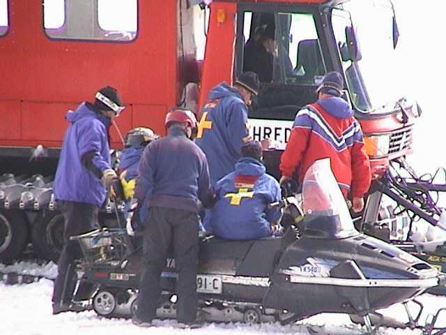 Ski Patrol calculating who proceeds after the two qualifying runs