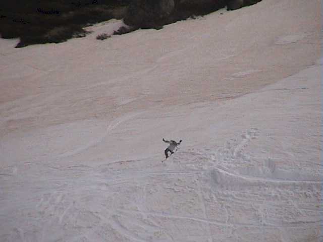 Boarders and skiers enjoying Charlies jump