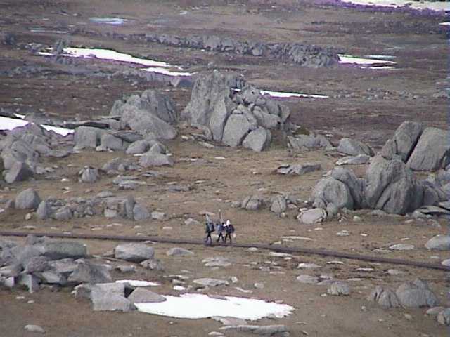 More skiers half way out towards Mt Kosciuszko