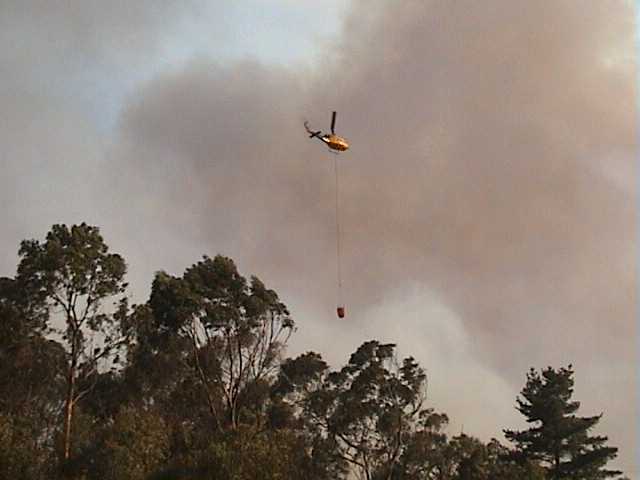 Loading next door then water bombing on the south side of Cattai Ridge Rd