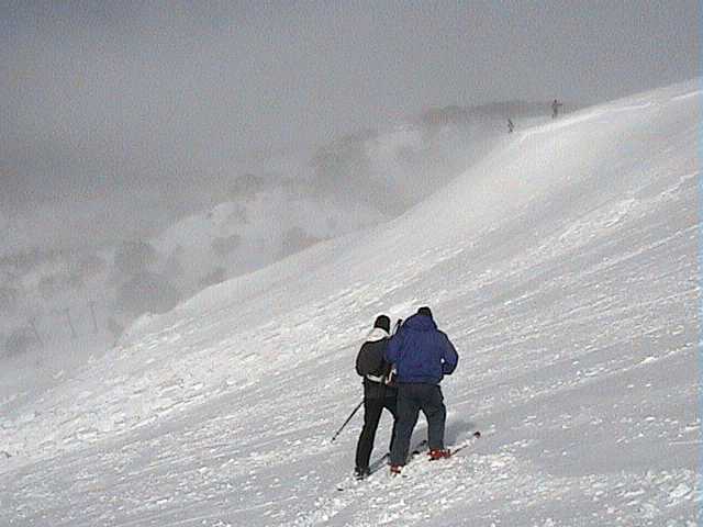 The top of the Bluff slide with Ski Patrol inspecting