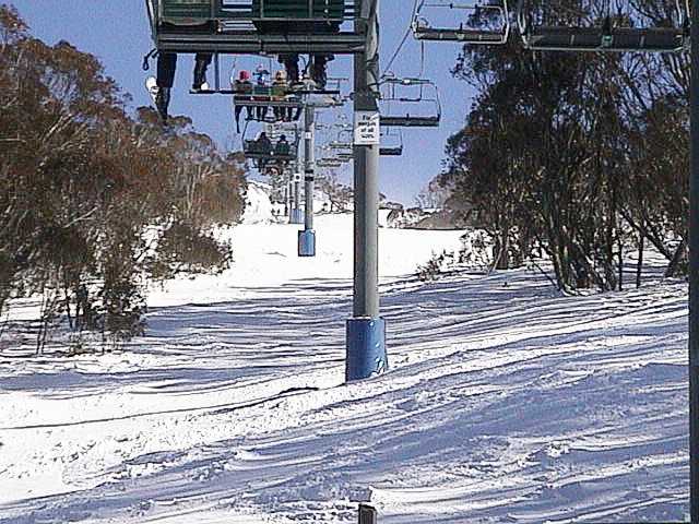 Clear blue skies over crisp dry snow