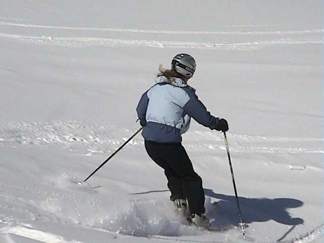 Linda cutting the powder