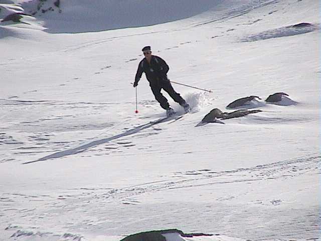 Ray working the firm and in places icy drifts