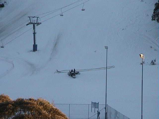 Setting up snow guns at the bottom of Lovers Leap Bypass