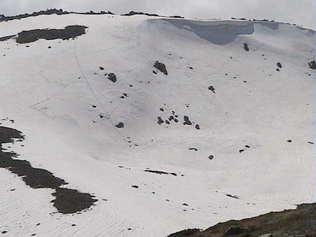 The turns and boarders' steps just visible from the other side of the valley