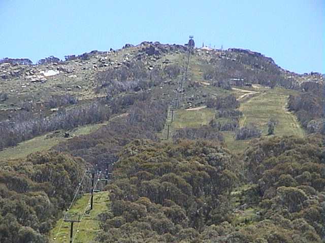 The last patch of snow on the Bluff (far left)