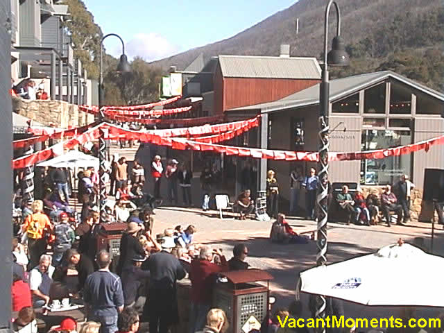 Village Square crowd outside Squatters Run enjoying both sun and music