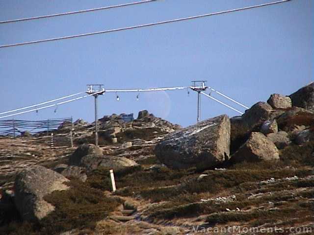 Ice sitting on Karels T-Bar with moon behind