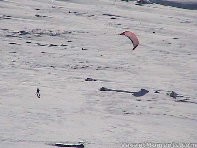 Kite skier behind Eagles Nest