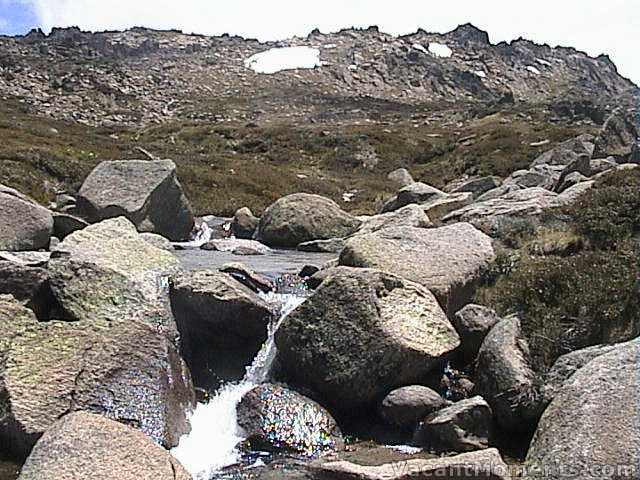 Last snows on Signature Hill in the background