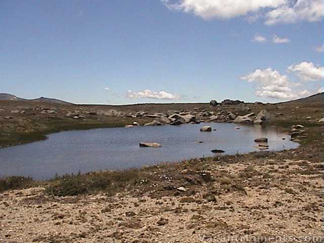 Small alpine lake (name unkown) under a so blue sky