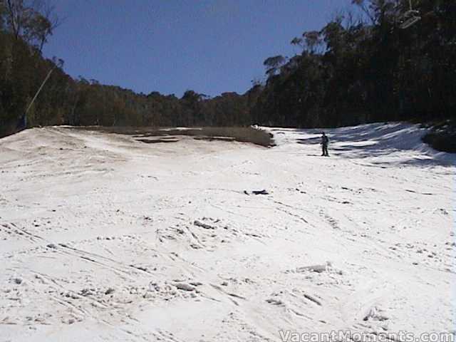 Bottom of High Noon  snow on skiers left under Merritts chair