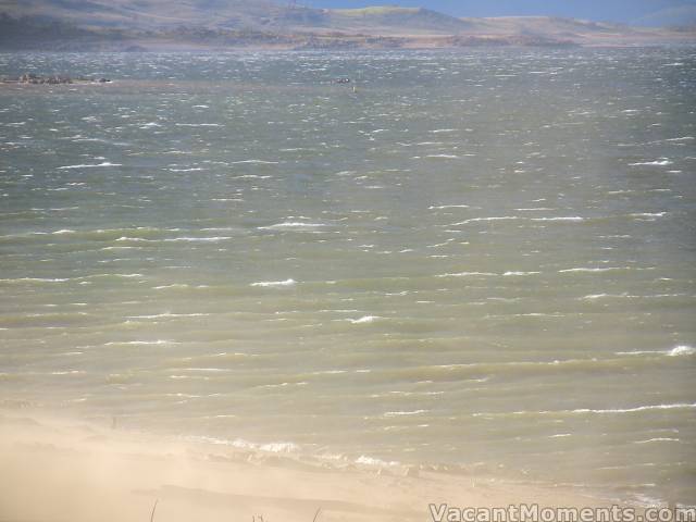 Waves and sand-filled winds