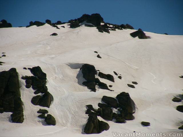 Wet slides on the northern chutes