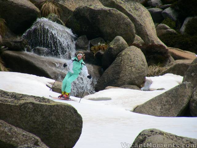 Marion tempts fate below the waterfall one more time