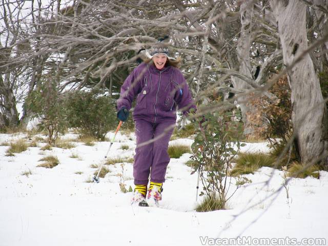 Marion dodging trees and grass