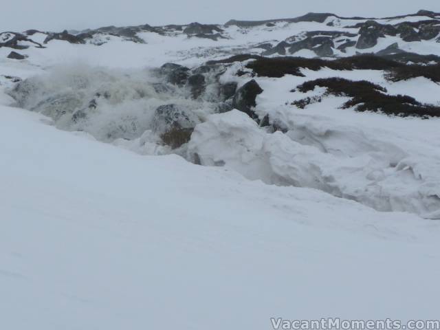 Raging waters of Merritts Creek splitting the resort (photo by Rosco)