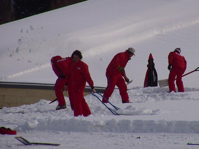 What ski instructors do when class is out - shovel the roof