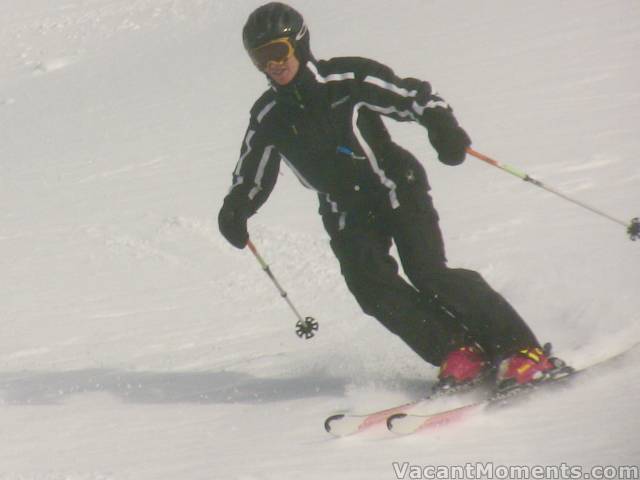 Marion in ski boots and helmet - looks good to me