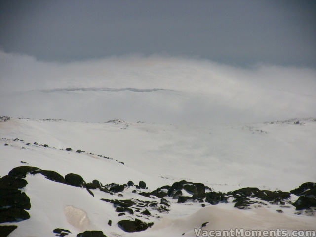 A pink glow on top of Mt Kosciuszko - partially hidden by cloud