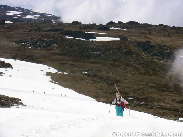 Marion climbing out of the cloud to the back door of Signature Hill