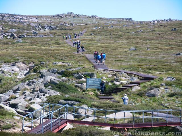 Crowds beyond the bridge