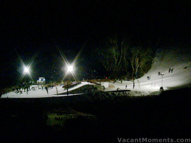 The night time event behind the tennis courts