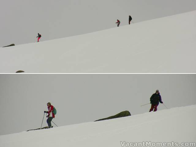 Same three descending the main face of the hill