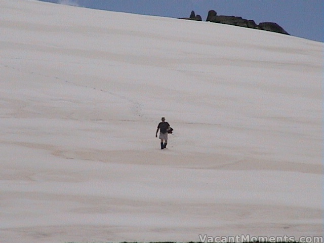 Ray walking back from his hike outback