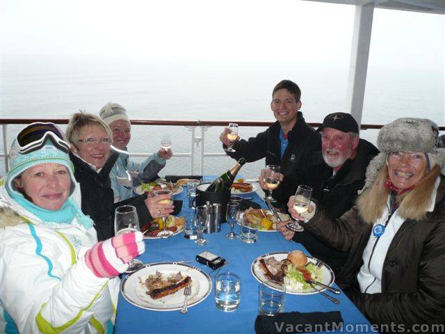 Our group enjoys the onboard BBQ in freezing conditions