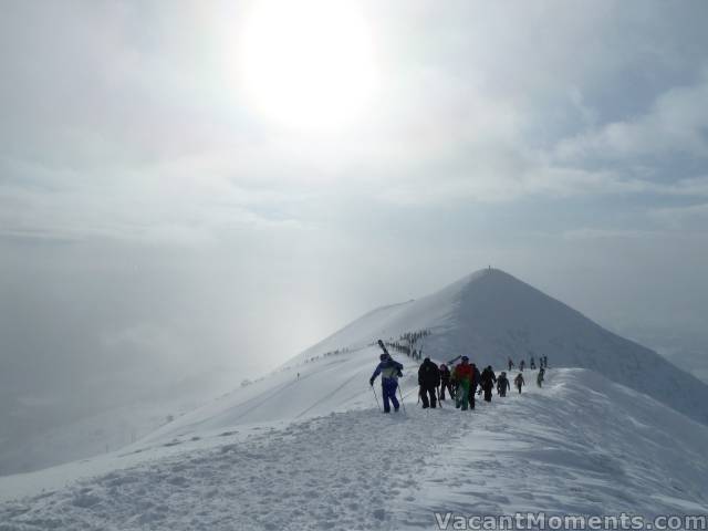 Crowds swarm to the peak after being closed for a few days