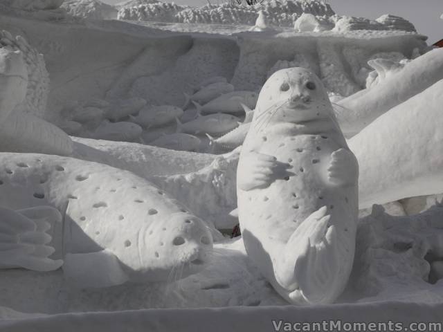 Snow carvings are on a huge scale, which this photo does not give credit