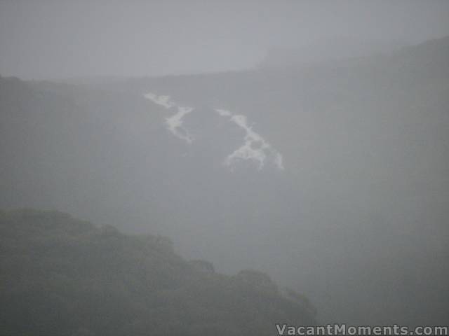 Merritts Creek across the valley through heavy rain