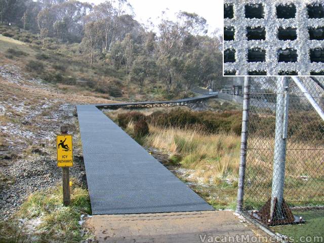 A great new <strong>non-slip</strong> walkway between the tennis courts and bobsled<BR>Close up of the special coating on the metal grid