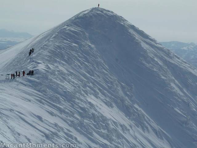 One stands alone above the massing hordes<BR>whilst Rosco takes his photo from the other peak