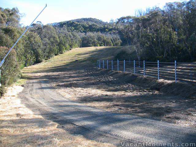 Looking back up High Noon from the new High Noon extension<BR>Note fenced off Summer Road run for beginners