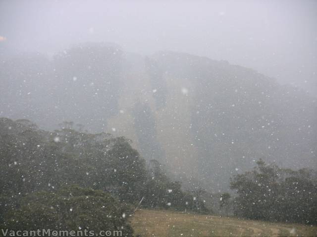 The start of yesterday's snow fall with High Noon in the background