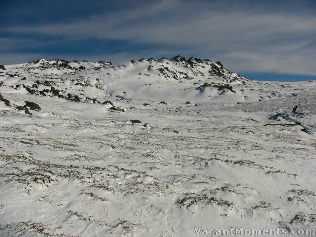 Wind swept tundra out towards the 'Hill'<BR>the bridge at centre-right