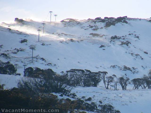 The wind blowing snow across Sponars T-bar track this afternoon