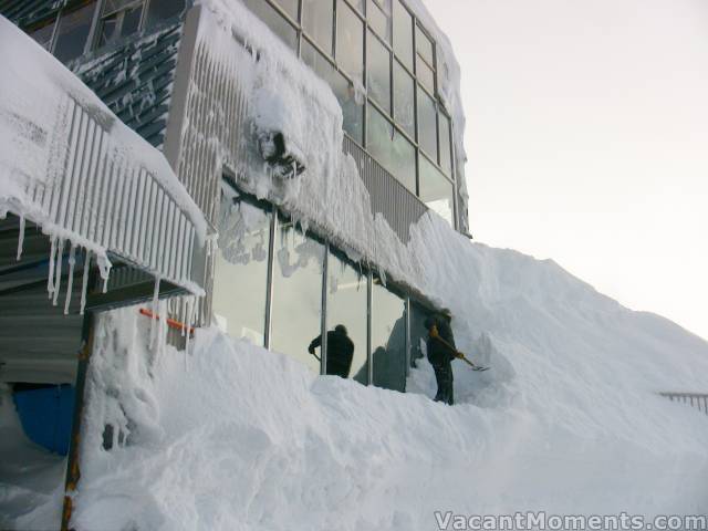 Steve digging out the Bullwheel Bistro windows after having already done Eagles Nest's windows