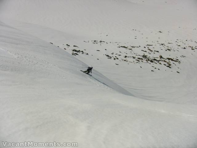 Spiralling down the steep, safely between the cornices