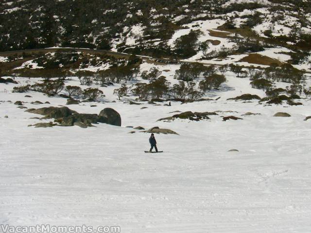 Uncrowded slopes and cars parked at Eyre T-bar base<BR>The road is open to Spencers Creek