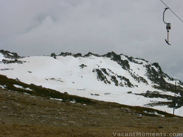 Saturday: Very overcast and threatening rain meaning an empty Basin<BR>Sig Hill from the top of Basin T-bar