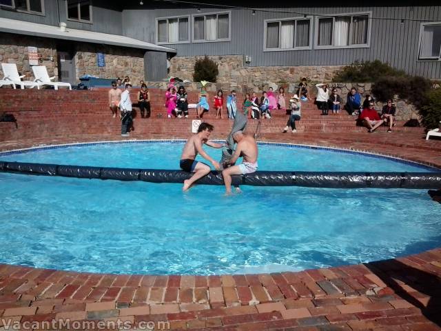 Son vs Dad - Sam vs Tim on the greasy pole over a very cold pool