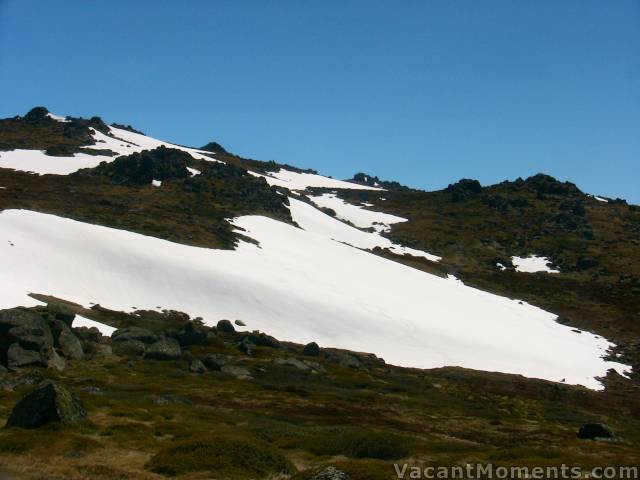 There was a narrow snow bridge between the top half and lower sections