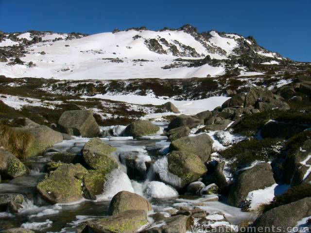 Looking out to the hill from the bridge<BR>Some ice formations looked like ice bergs on the creek