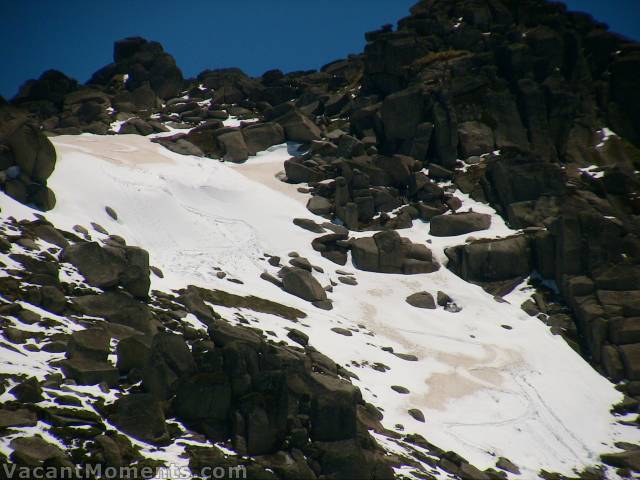 The North Face was more challenging with big snowballs<BR>generated by fresh snow on a wet grass base